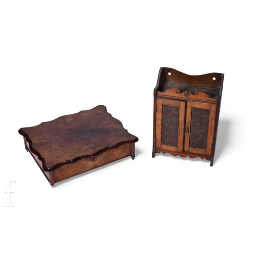 822 - A Victorian walnut sewing cabinet top with compartmentalised interior, lacking base, width 51cm, and... 