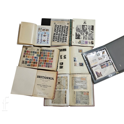 679 - A collection of Great Britain and worldwide postage stamps to include a Stanley Gibbons Windsor Albu... 