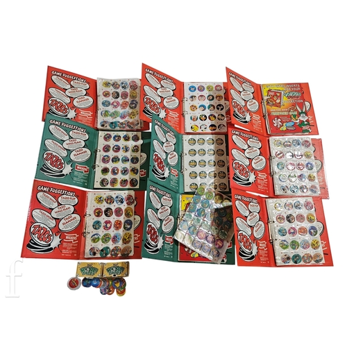 682 - A collection of Walkers Tazo counters, various themes and sets contained in nine Tazos albums and a ... 