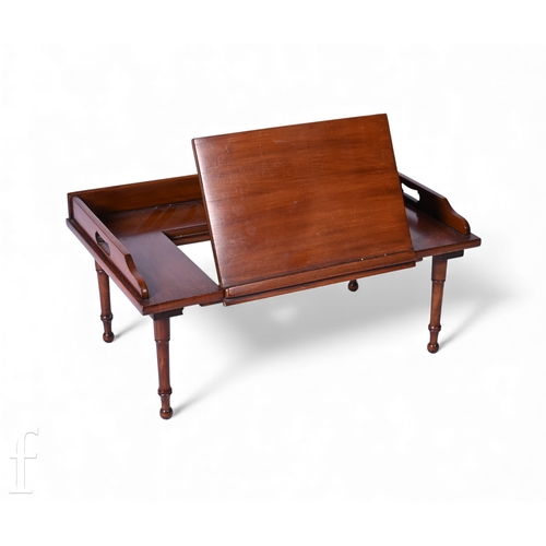 840 - A reproduction mahogany lap table or desk, the gallery sides with pierced grip handles with a centra... 