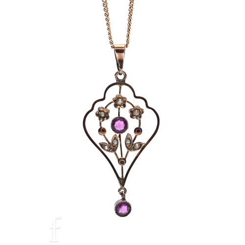8 - An Art Nouveau amethyst and seed pearl pendant, the circular mixed-cut amethyst collet set within a ... 