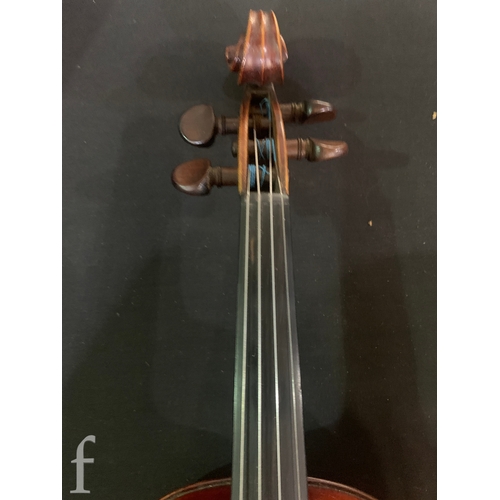 468 - A late 19th Century violin labelled Joseph Guarnerius filius Andrea fecit, length 36cm in plush line... 