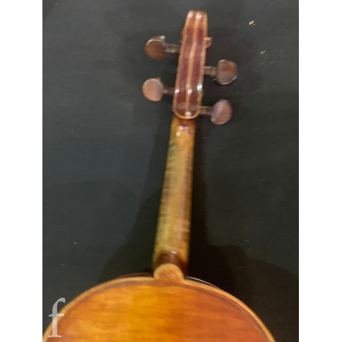 468 - A late 19th Century violin labelled Joseph Guarnerius filius Andrea fecit, length 36cm in plush line... 