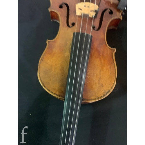 470 - A late 19th Century German violin labelled Antonius Stradivarius, two piece back with bow, length 35... 