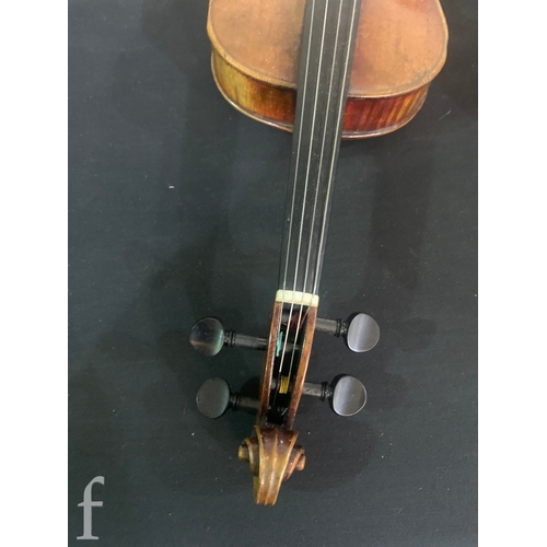 470 - A late 19th Century German violin labelled Antonius Stradivarius, two piece back with bow, length 35... 