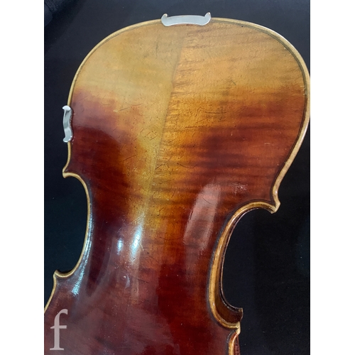 470 - A late 19th Century German violin labelled Antonius Stradivarius, two piece back with bow, length 35... 
