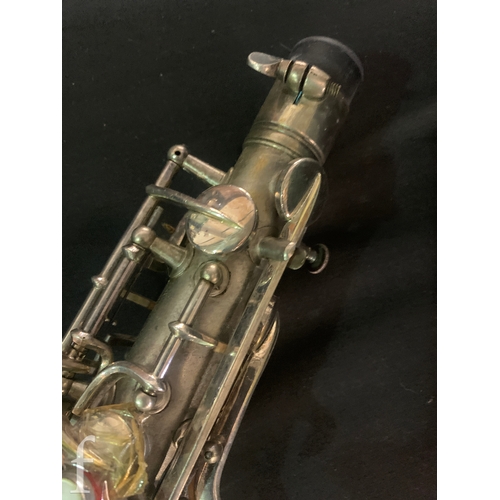 472 - A 20th Century or earlier nickel plated saxophone No 111892, length 62cm, in fitted plush lined case... 
