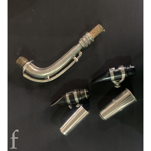 472 - A 20th Century or earlier nickel plated saxophone No 111892, length 62cm, in fitted plush lined case... 