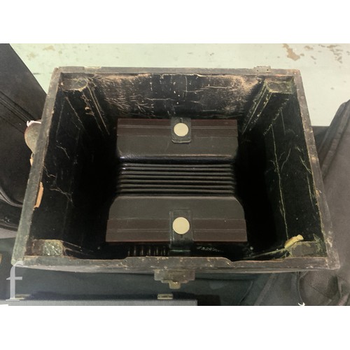 480 - A late 19th to early 20th Century octagonal cased concertina, thirty two button operation, in pine c... 