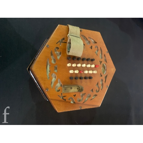 458 - A 20th Century concertina by Lachenal & Co London, No 42616, forty eight key operation, in assoc... 