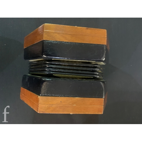 458 - A 20th Century concertina by Lachenal & Co London, No 42616, forty eight key operation, in assoc... 
