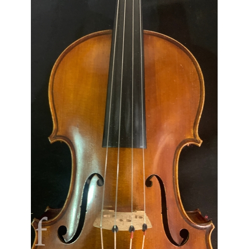 465 - A late 19th Century two piece back violin labelled Le Guerrier anno 1884, examined by William Hargre... 