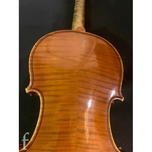 465 - A late 19th Century two piece back violin labelled Le Guerrier anno 1884, examined by William Hargre... 