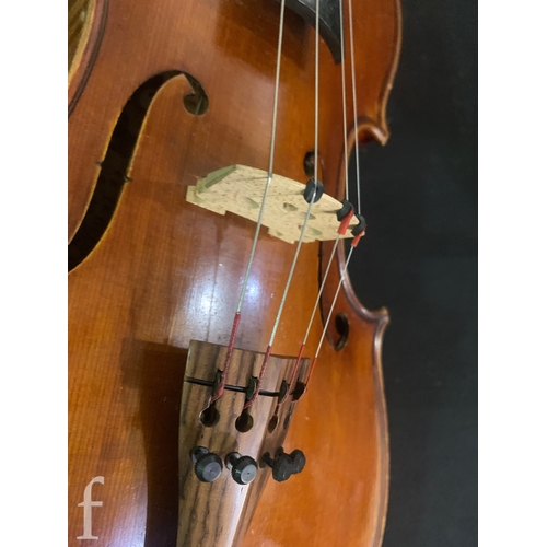 465 - A late 19th Century two piece back violin labelled Le Guerrier anno 1884, examined by William Hargre... 