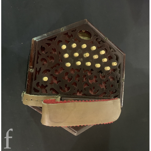 455 - A 19th Century concertina by Lachnal & Co London No 142550, thirty three keys, in octagonal maho... 
