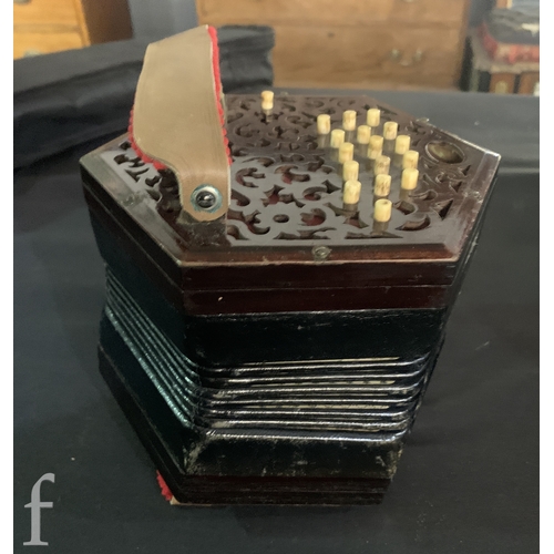 455 - A 19th Century concertina by Lachnal & Co London No 142550, thirty three keys, in octagonal maho... 