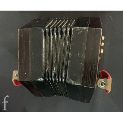 455 - A 19th Century concertina by Lachnal & Co London No 142550, thirty three keys, in octagonal maho... 
