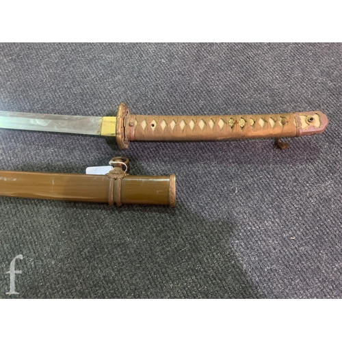 650 - A World War Two Japanese officers Katana, 70cm blade, cloth bound shagreen grip and pierced iron Tsu... 