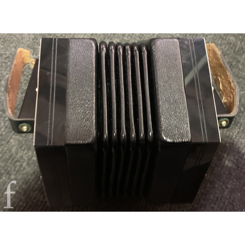 454 - A 20th Century concertina by Crabb London, No 18402, thirty eight key operation, in black case.