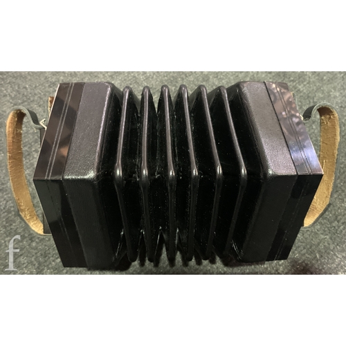 454 - A 20th Century concertina by Crabb London, No 18402, thirty eight key operation, in black case.