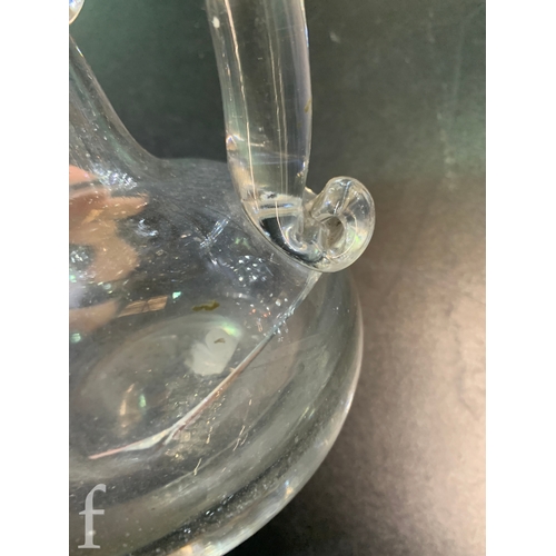 266 - A 19th Century clear crystal globe and shaft decanter with printie cut triple band, below diaper cut... 