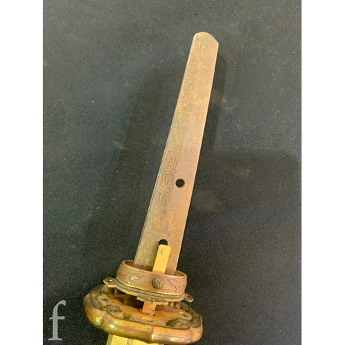 650 - A World War Two Japanese officers Katana, 70cm blade, cloth bound shagreen grip and pierced iron Tsu... 