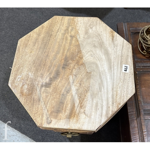 779 - A 19th Century mahogany octagonal cellarette fitted with a divisioned interior on moulded block legs... 