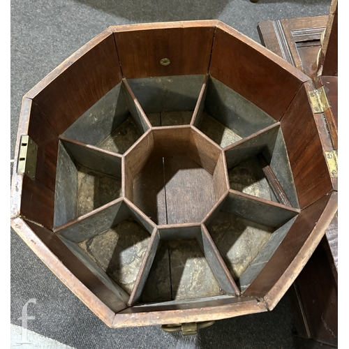 779 - A 19th Century mahogany octagonal cellarette fitted with a divisioned interior on moulded block legs... 