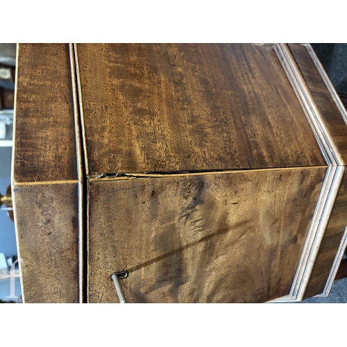 779 - A 19th Century mahogany octagonal cellarette fitted with a divisioned interior on moulded block legs... 