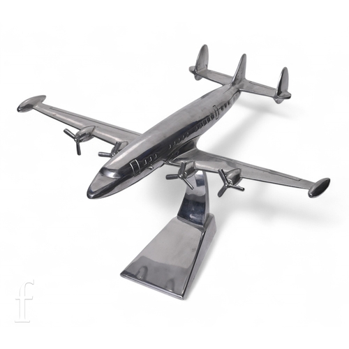 A promotional large aluminium Lockheed Constellation aircraft, four propellers and triple tail fin on a swept stand and wedge base, length 52cm.
