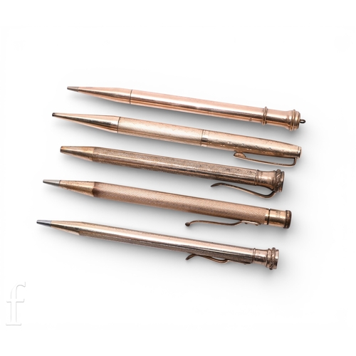 403 - A collection of early to mid 20th Century rolled gold propelling pencils, each of varying plain and ... 
