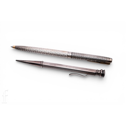 404 - Two Sterling silver writing implements, to including a mechanical pencil and a ballpoint pen, both s... 