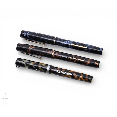409 - A collection of Waterman's 1930s 'Ideal' fountain pens, two stamped 'Made In England', one stamped '... 