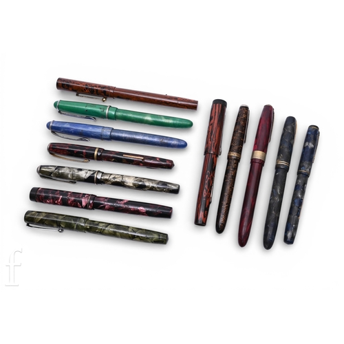 410 - A collection of vintage 1930s celluloid marbled pens, to include various makers include Burnham, Men... 