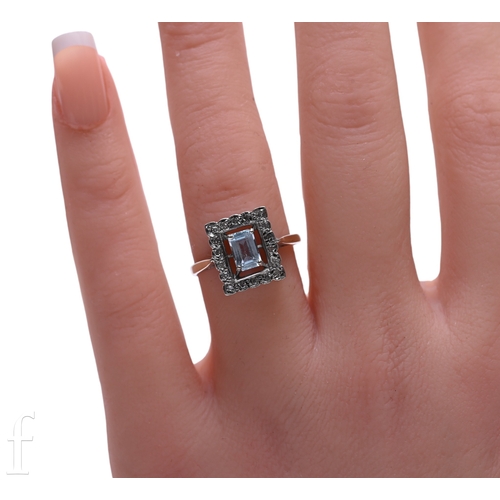 123 - An aquamarine and diamond ring, the step-cut aquamarine four claw set within a border of circular-cu... 