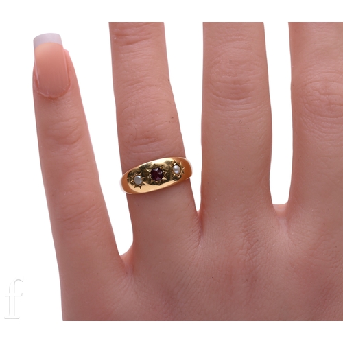 129 - A late Victorian ruby and half pearl ring, all set in star settings, not marked, total weight 3.3g, ... 