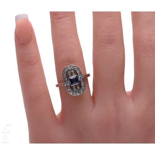 130 - A sapphire and diamond ring, the oval mount set with eight-cut diamonds and with a square-cut sapphi... 