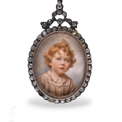 392 - A mid Victorian portrait miniature pendant, the oval portrait on paper, of a young boy set with a bo... 