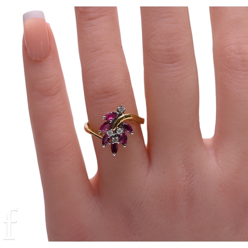 171 - A ruby and diamond ring, of trailing flower design, set with six pear-cut rubies and four brilliant-... 