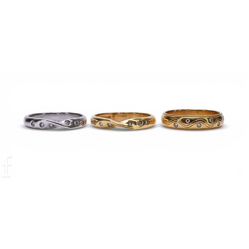 160 - An 18 carat white gold and diamond band, of cross over design, set with six brilliant-cut diamonds, ... 