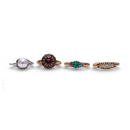 134 - A garnet cluster ring, mounted in 9 carat yellow gold, hallmarked, total weight 2.1g, ring size K1/2... 