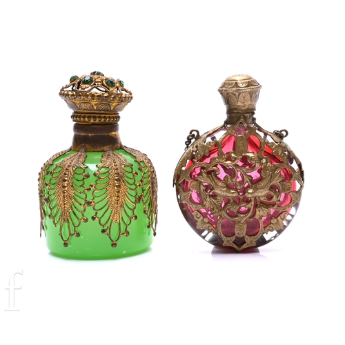 462 - A late 19th Century Palais Royale style perfume flask, the flattened circular ruby glass body with g... 
