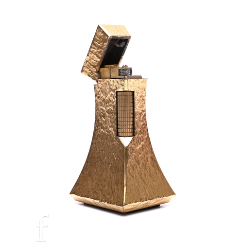 395 - A Dunhill Wheatsheaf table lighter in a gold plated textured finish, 7cm high.