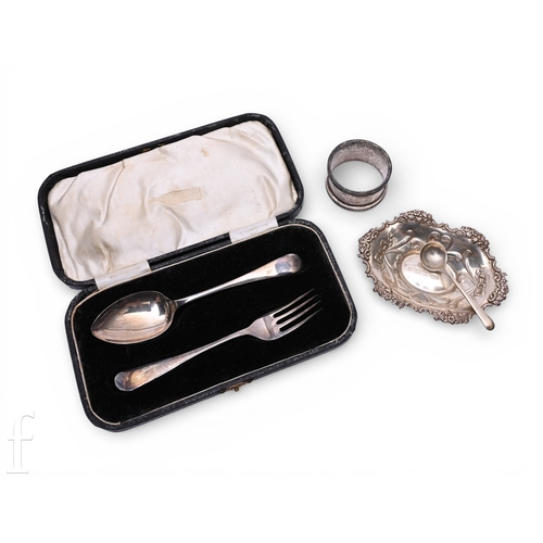 493 - A small parcel of assorted silver flatware to include a cased two piece christening set of spoon and... 