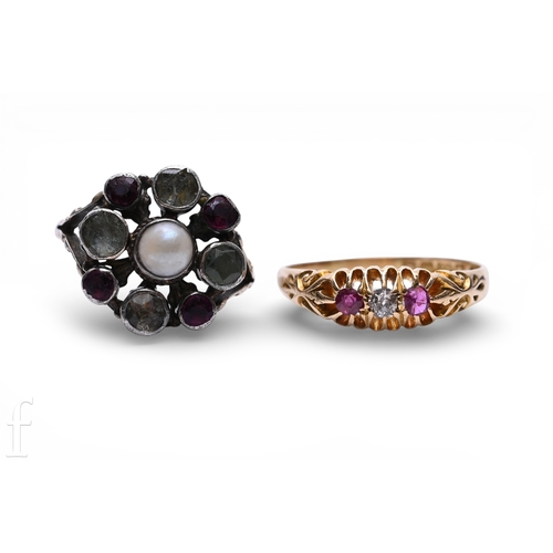 136 - An Edwardian ruby, diamond and gold ring, the old brilliant-cut diamond between to mixed cut diamond... 