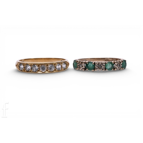 139 - An emerald and diamond half hoop eternity ring, set with four circular mixed-cut emeralds and three ... 