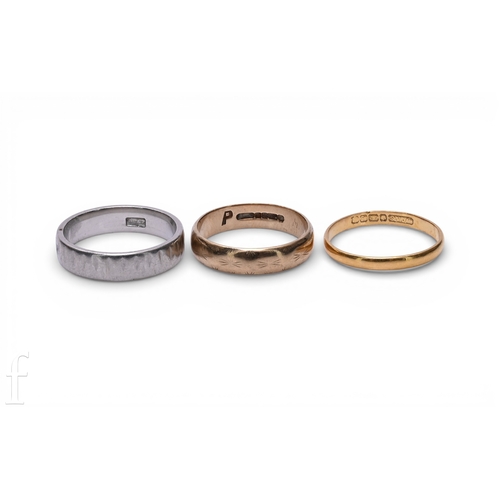 107 - A 22 carat gold wedding band, total weight 1.9g, ring size N, a 9 carat gold wedding band with engra... 