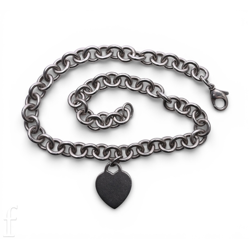 167 - Tiffany & Co; a heart shaped pendant, marked 'Tiffany & Co' and hallmarked for Tiffany &... 