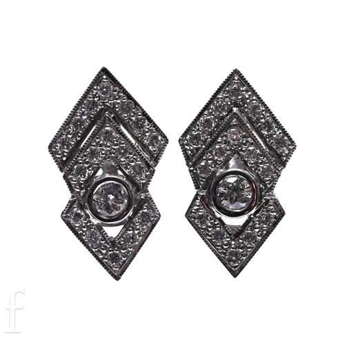 199 - A pair of diamond earrings, of geometric design, the central collet set brilliant-cut diamonds withi... 