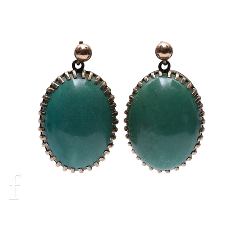 66 - A pair of turquoise drop earrings, the cabochon stones with yellow metal unmarked pierced mounts, an... 
